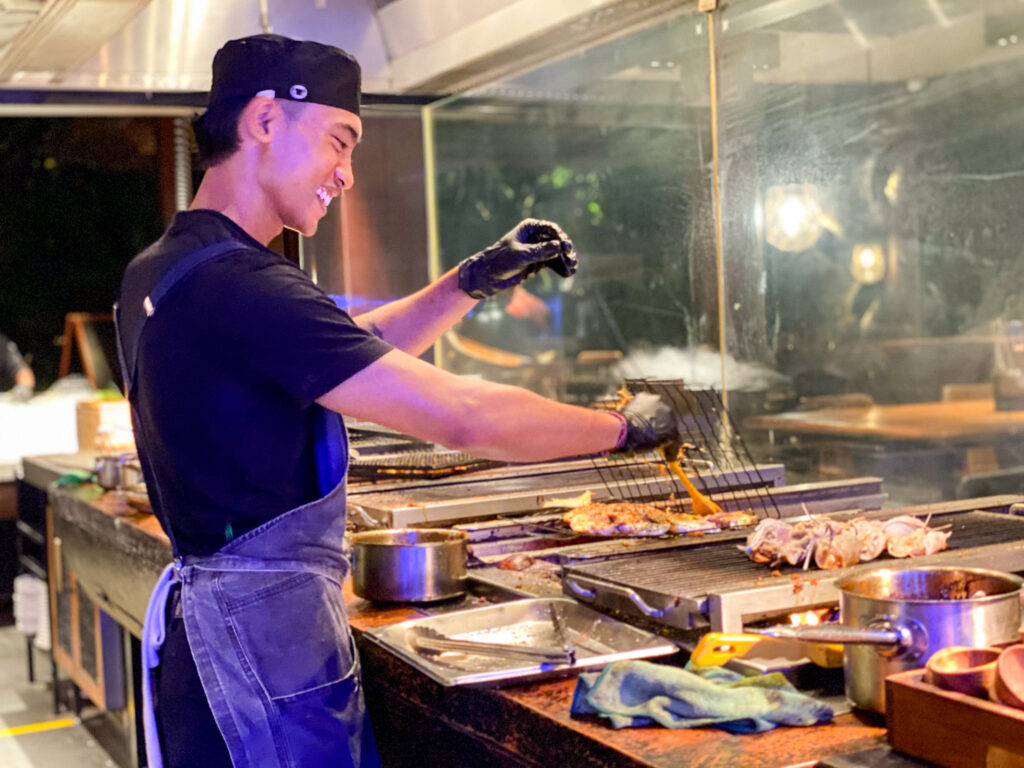 Talented chefs cooking fresh seafood at Fisherman's Club at Hyatt Regency, Bali. Photo: Harmeet Sehgal